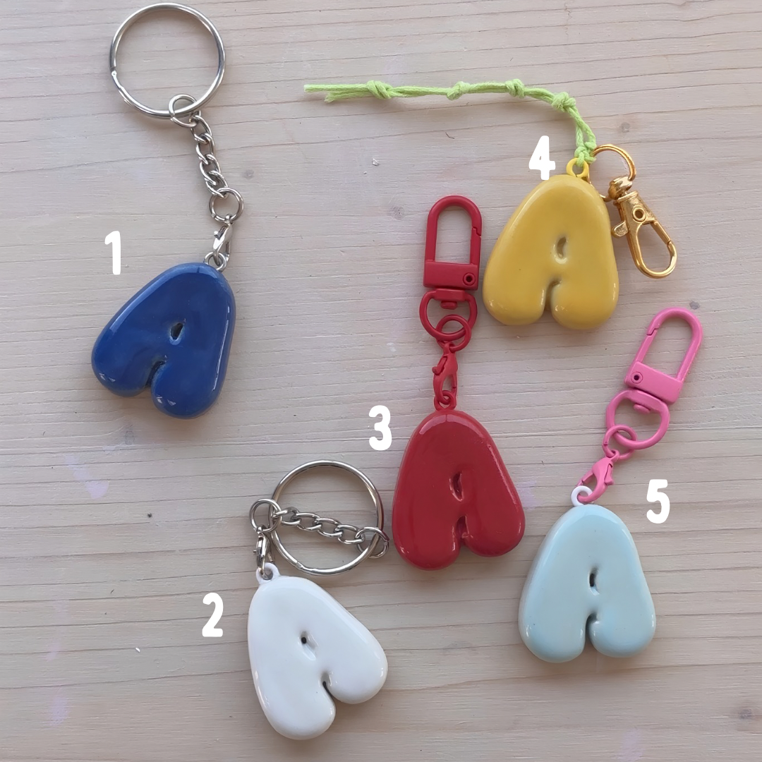Porte-clés initiale de couleur