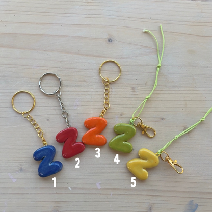Porte-clés initiale de couleur