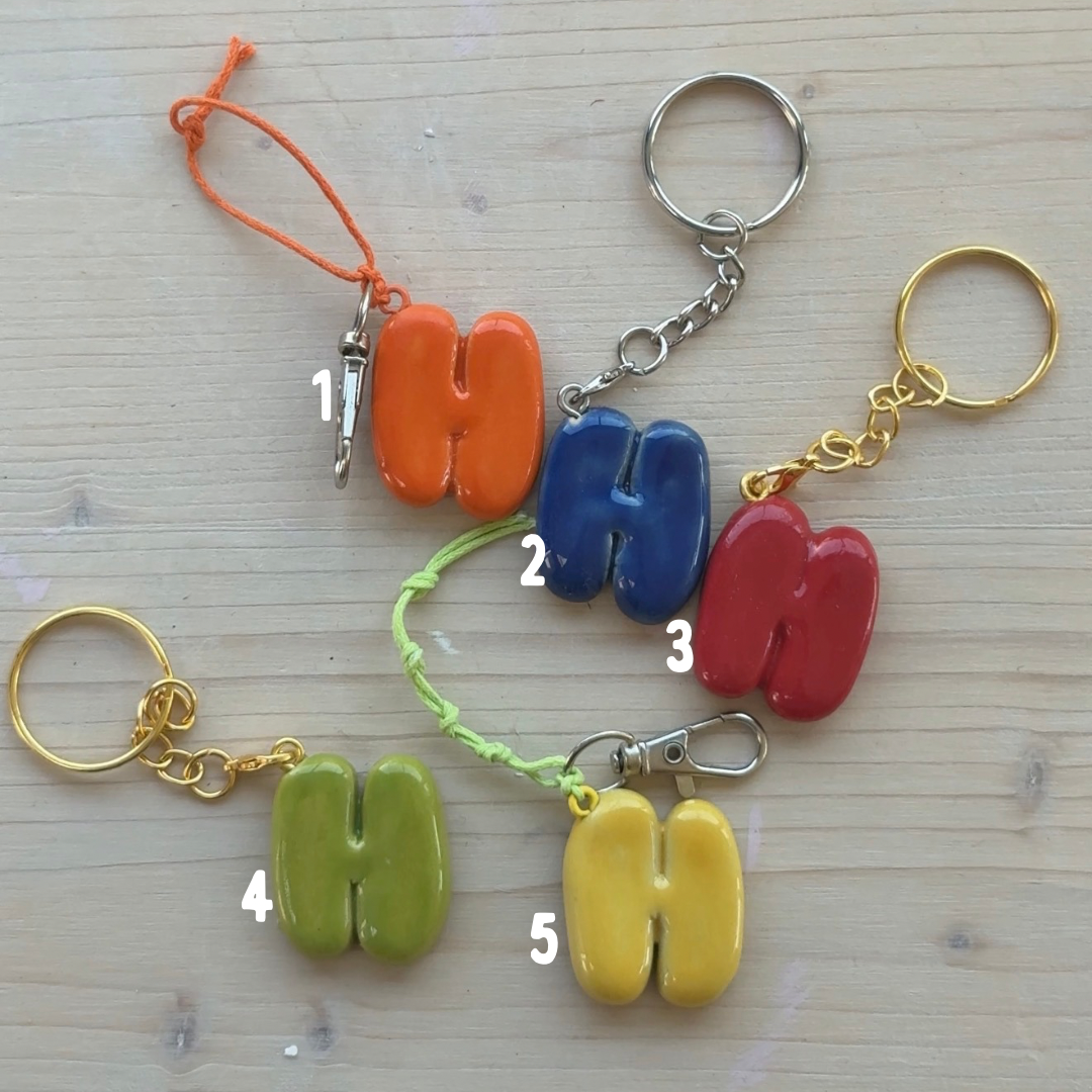 Porte-clés initiale de couleur