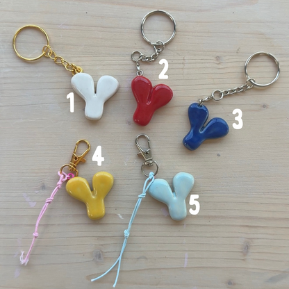 Porte-clés initiale de couleur