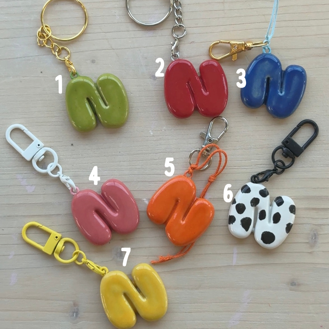 Porte-clés initiale de couleur
