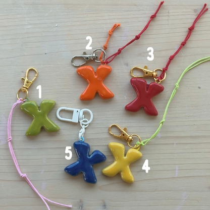 Porte-clés initiale de couleur