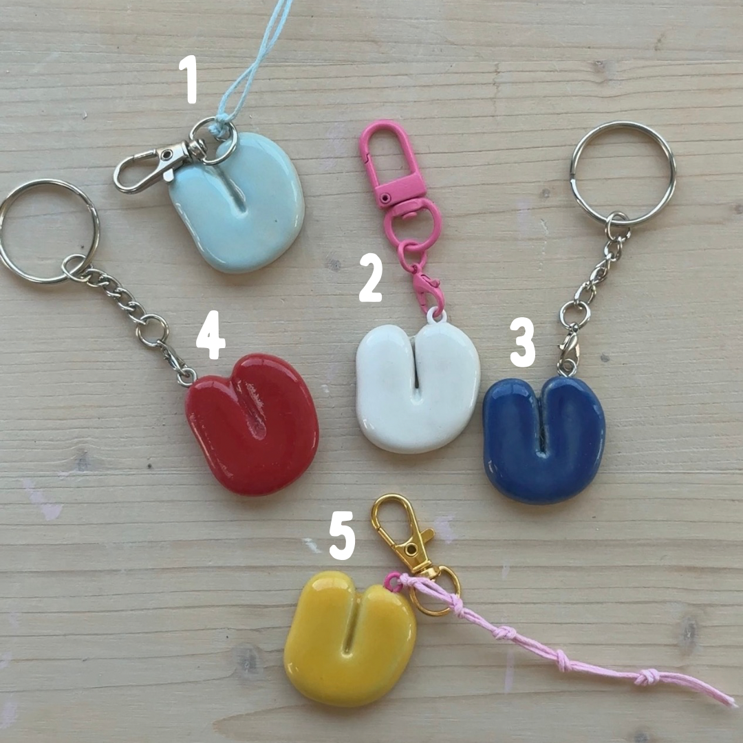 Porte-clés initiale de couleur