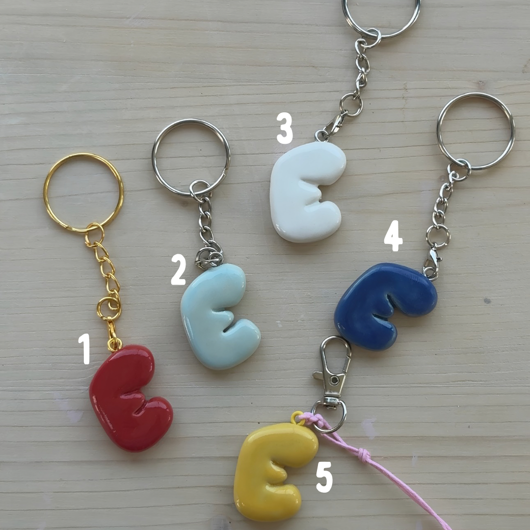 Porte-clés initiale de couleur